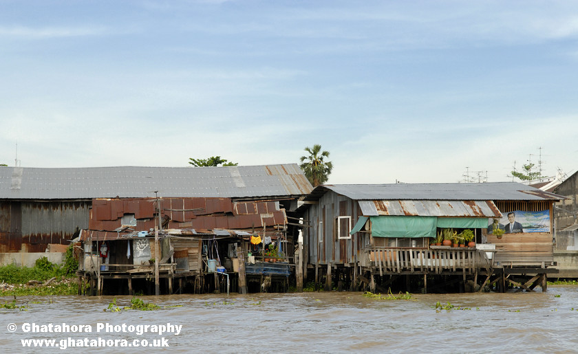 DSC8371 
 River houses on banks of Chao Phraya River 
 Keywords: Wat, tower, temple, buddha, shrine, Bangkok, Thailand, Chao Phraya River, , Bhupinder Ghatahora, , Ghatahora Photography